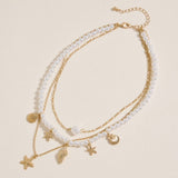 Layered Pearl Necklace with Sea Charms: NT