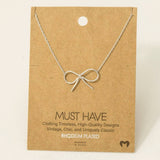 Gold Dipped Bow Tie Pendant Necklace: G