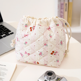Patterned Quilted Drawstring Cosmetic Bag: Blue Flower