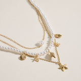 Layered Pearl Necklace with Sea Charms: NT